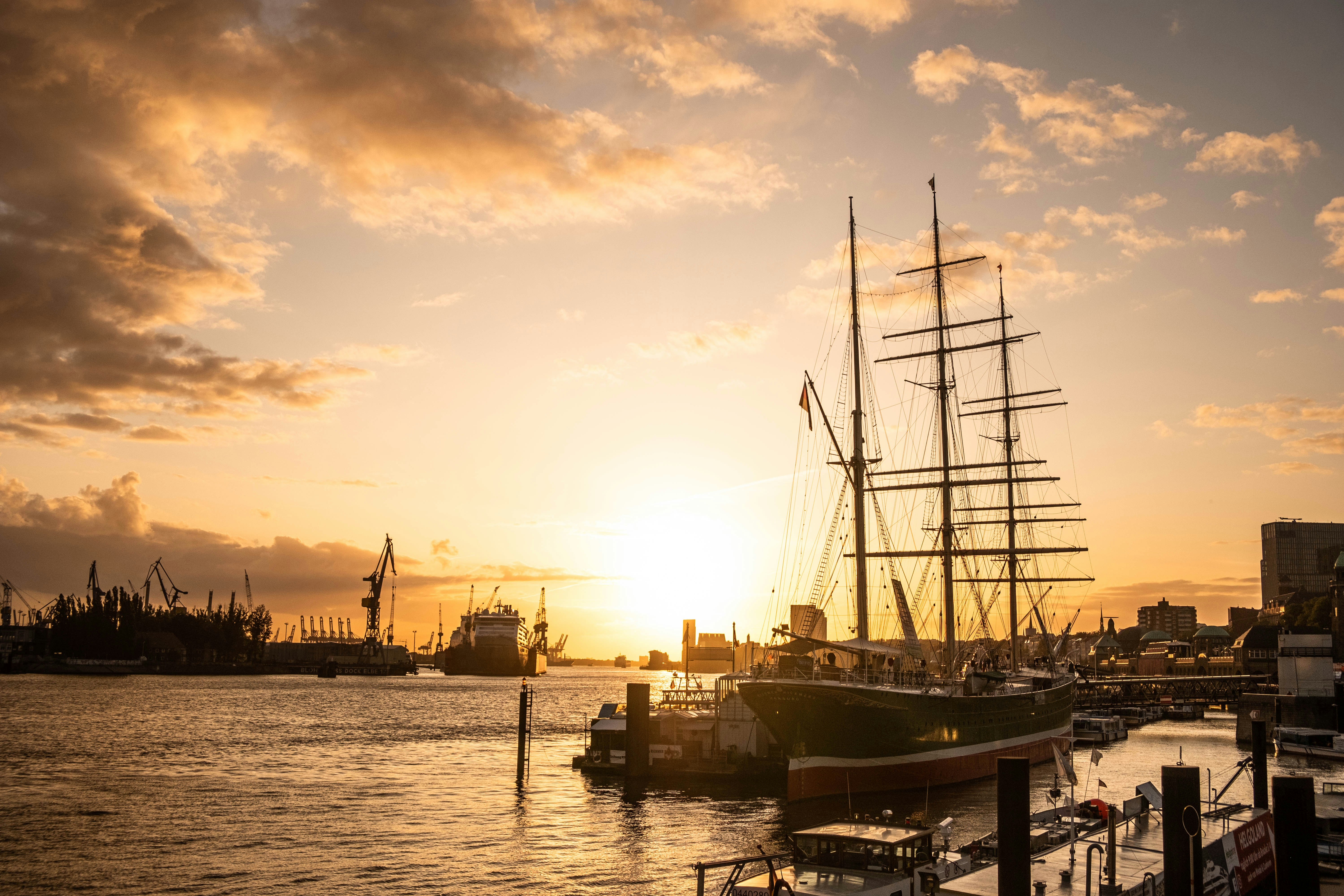 sailboat in dock during golden hour